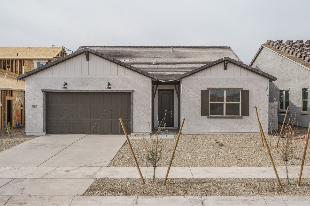 The Grove at El Cidro - Ash Farmhouse - Front Exterior:ash farmhouse new homes for sale the grove at el cidro goodyear az william ryan