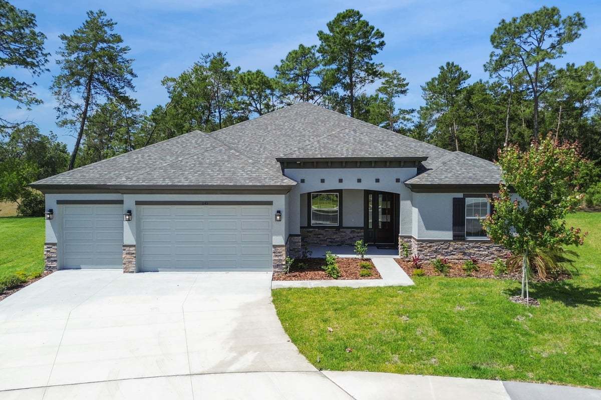 Strabane New Home Plan - Coastal Elevation with Optional Stone:Strabane new construction home plan by William Ryan Homes Tampa
