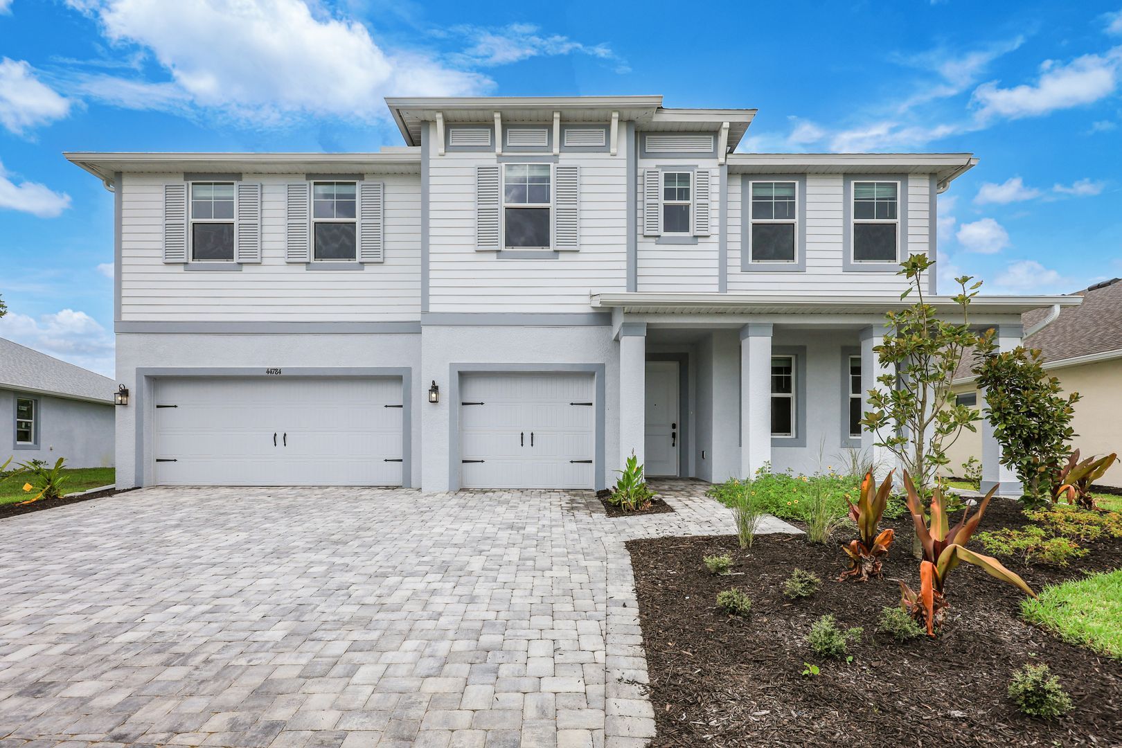 Jupiter New Home Plan - West Indies Elevation by William Ryan Homes Tampa:Jupiter new construction home plan at Two Rivers near Wesley Chapel, FL by William Ryan Homes Tampa